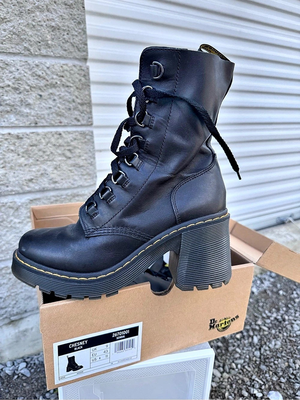 Dr. Martens Chesney Boots stand out with their bold, grooved flared heels US 11